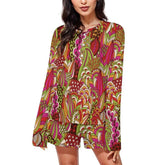 Colorful boho-chic women's pajama set with long-sleeved top and shorts featuring vibrant abstract floral pattern in red, pink, green, and orange
